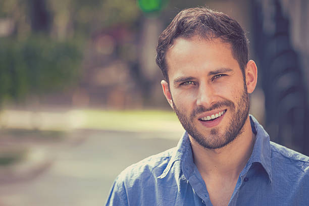 istock Happy man. Handsome guy in casual shirt smiling 599263028