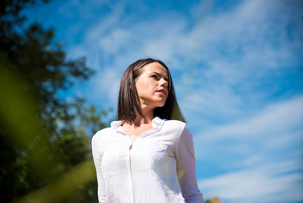 istock Young woman posing in nature 599264124