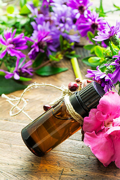 istock Essential oil, empty tags and roses flowers 599264304