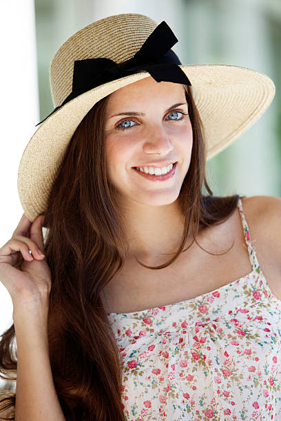 istock Happy young woman wearing hat 599264760