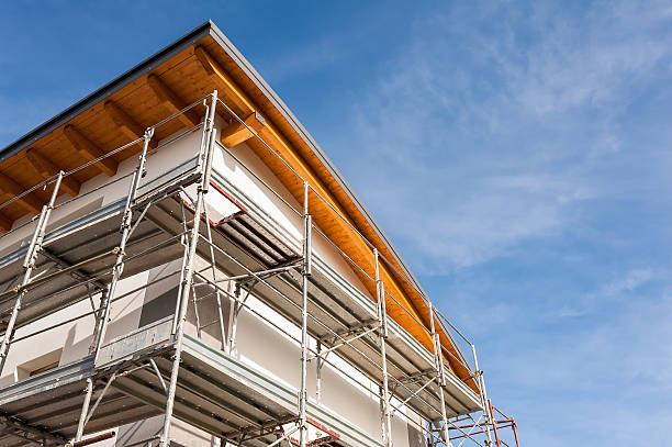 istock Construction scaffolding of a building under renovation. 599265786