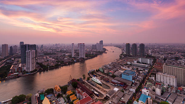 istock Dramatic after sunset sky, Bangkok city river curved 599265854