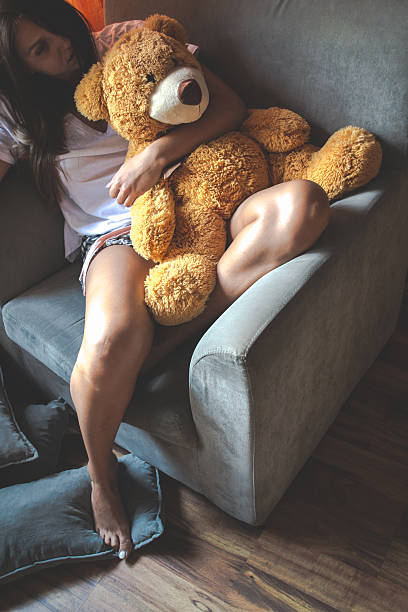 istock Young Girl with Teddy Bear 599267730