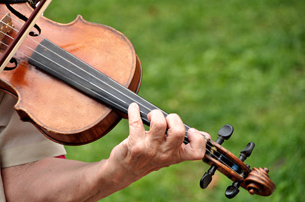 istock Woman playing the violin 599269052