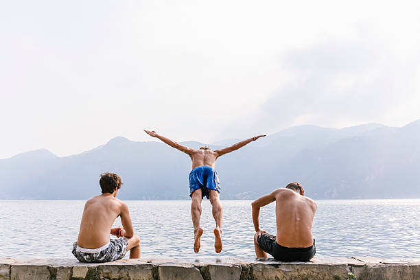 istock Man jump and dive in the water 599269502