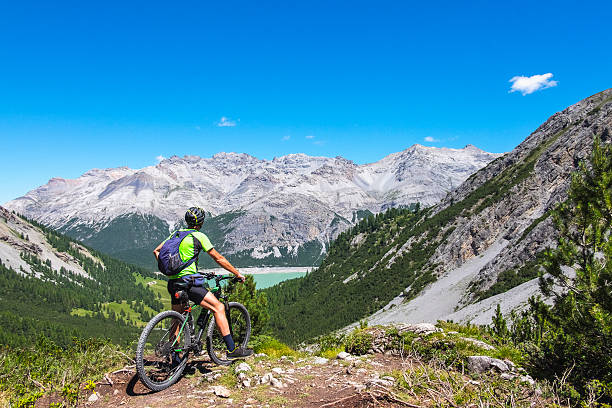 istock Hiker with mountain bike 599269690