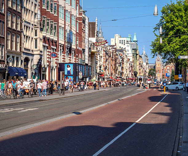 istock Amsterdam, Damrak on a summers day 599269850