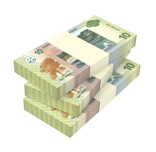 istock Surinamese dollar bills isolated on white background. 599269956
