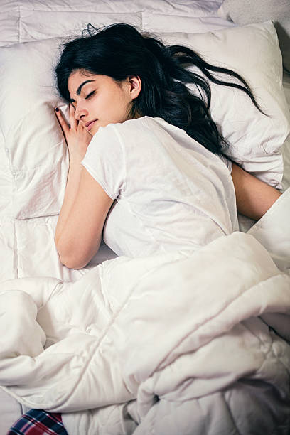 istock Young Beautiful Woman Sleeping 599271458