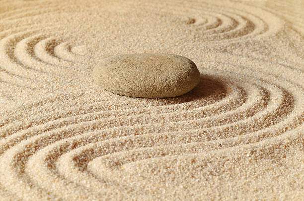 istock stones on the sand with circles 599272086
