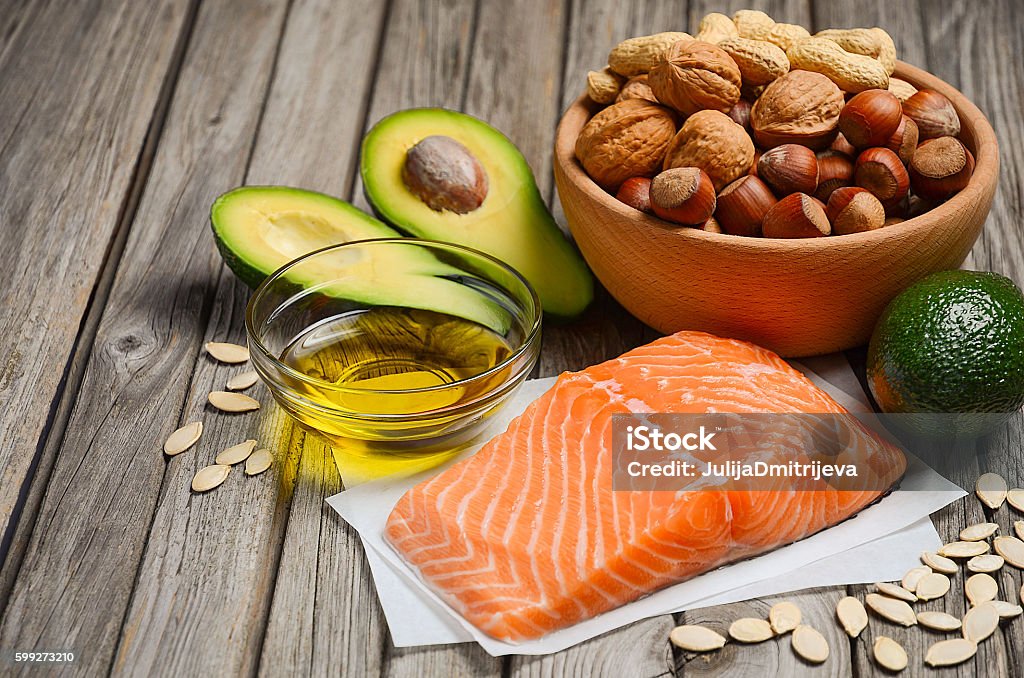 Selection of healthy fat sources Selection of healthy fat sources, rustic background, selective focus, copy space Salmon - Seafood Stock Photo