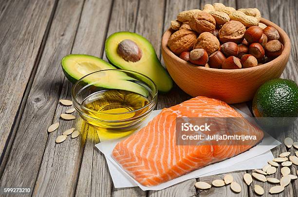 Selection Of Healthy Fat Sources Stock Photo - Download Image Now - Salmon - Seafood, Avocado, Cholesterol