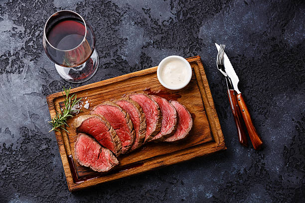 istock Sliced grilled tenderloin Steak roastbeef and Red wine 599273836