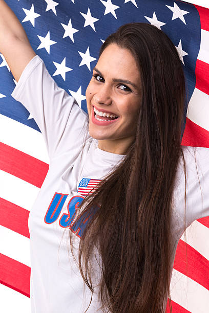 istock American fan holding USA flag 599275558