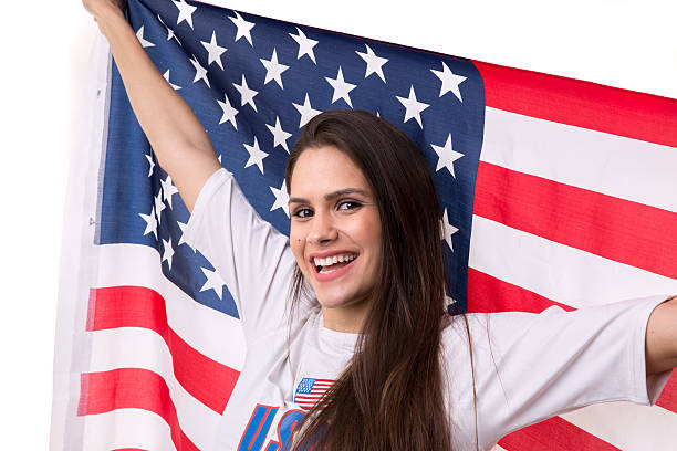 istock American fan holding USA flag 599275662