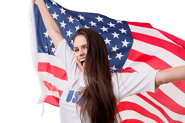 istock American fan holding USA flag 599275748