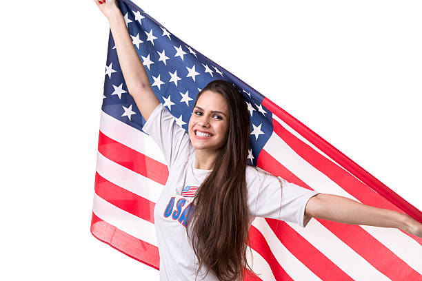 istock American fan holding USA flag 599275996