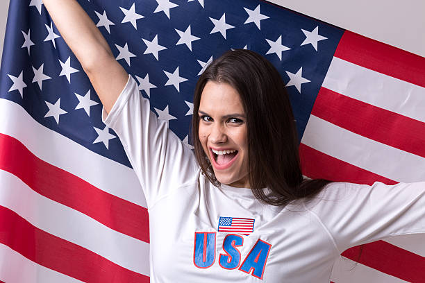 istock American fan holding USA flag 599276258