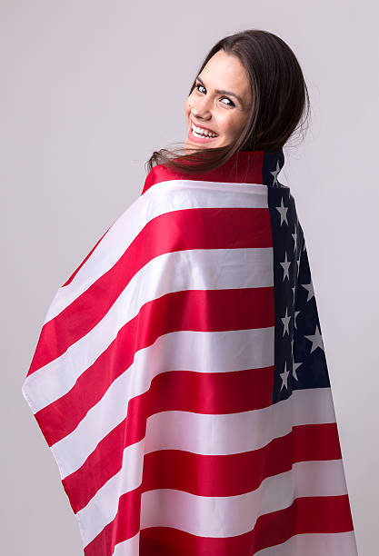 istock American fan holding USA flag 599276334