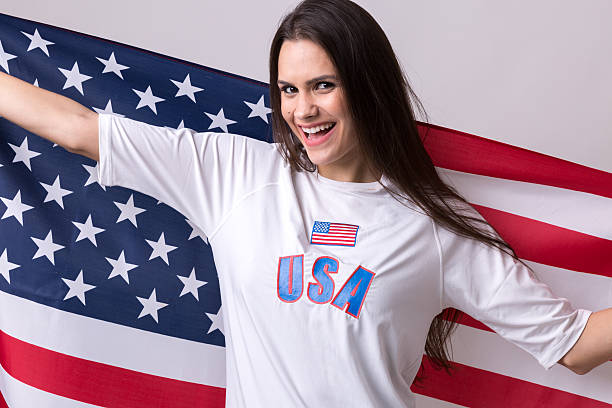 istock American fan holding USA flag 599276406