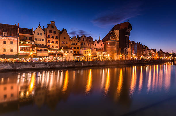 istock Gdansk old town with harbor and medieval crane, night view 599276578