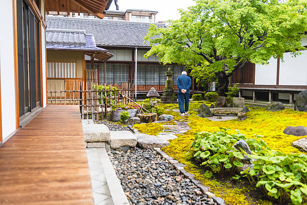 istock Senior man on temple garden 599282640