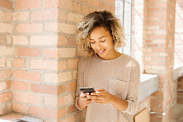 istock Woman sending messages 599461050