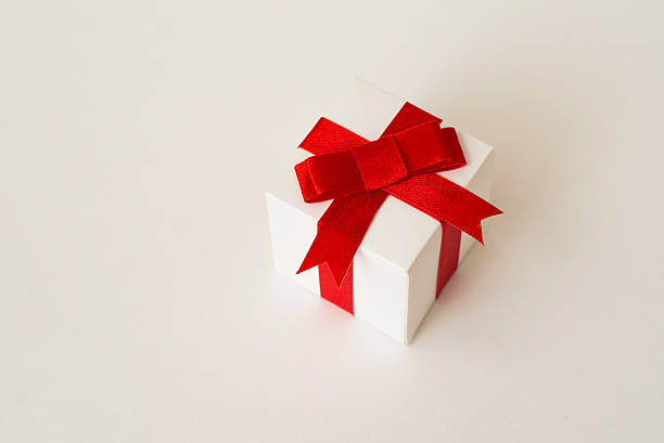 istock White gift box with red ribbon bow. clipping path 599462352