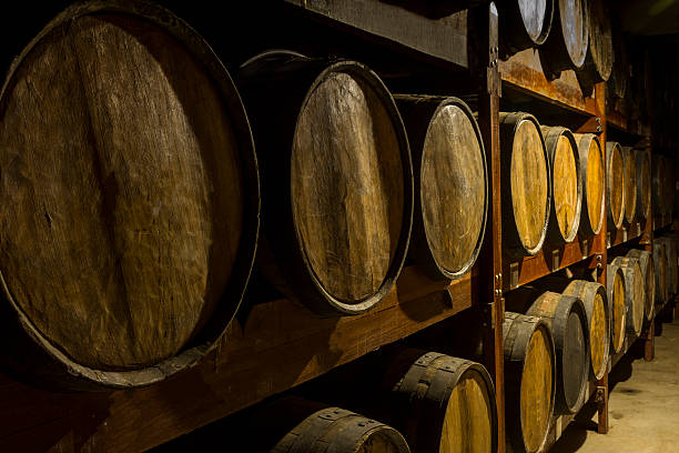 Wooden barrels deposit for brazilian cachaça aging sugarcane liquor stock photo