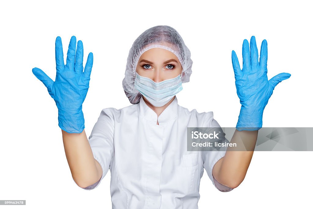 Frauen Arzt zeigt Hände in sterilen Handschuhen isoliert auf weiß, - Lizenzfrei Akademischer Abschluss Stock-Foto