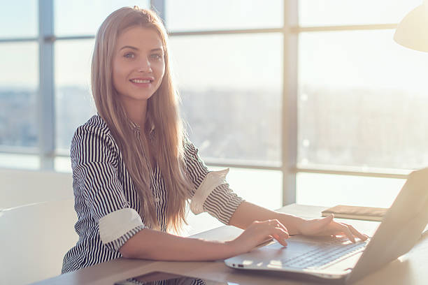 istock Woman working at home office hand on keyboard 599465910