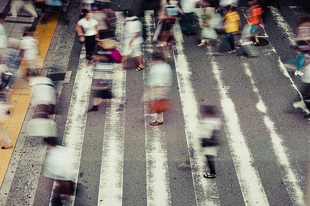 istock Asian People are across the crosswalk 599469862