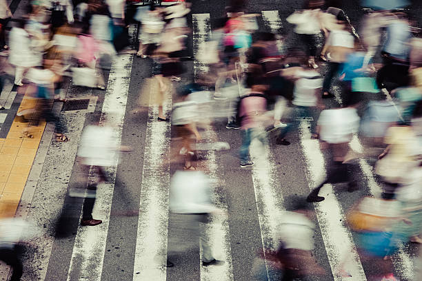 istock Asian People are across the crosswalk 599469886
