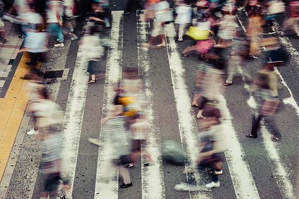 istock Asian People are across the crosswalk 599469910