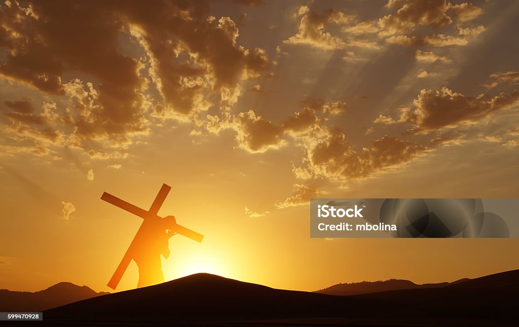 Jesus Christ Carrying Cross up Calvary on Good Friday Christ carrying cross up Calvary on Good Friday over bright sky Carrying Stock Photo