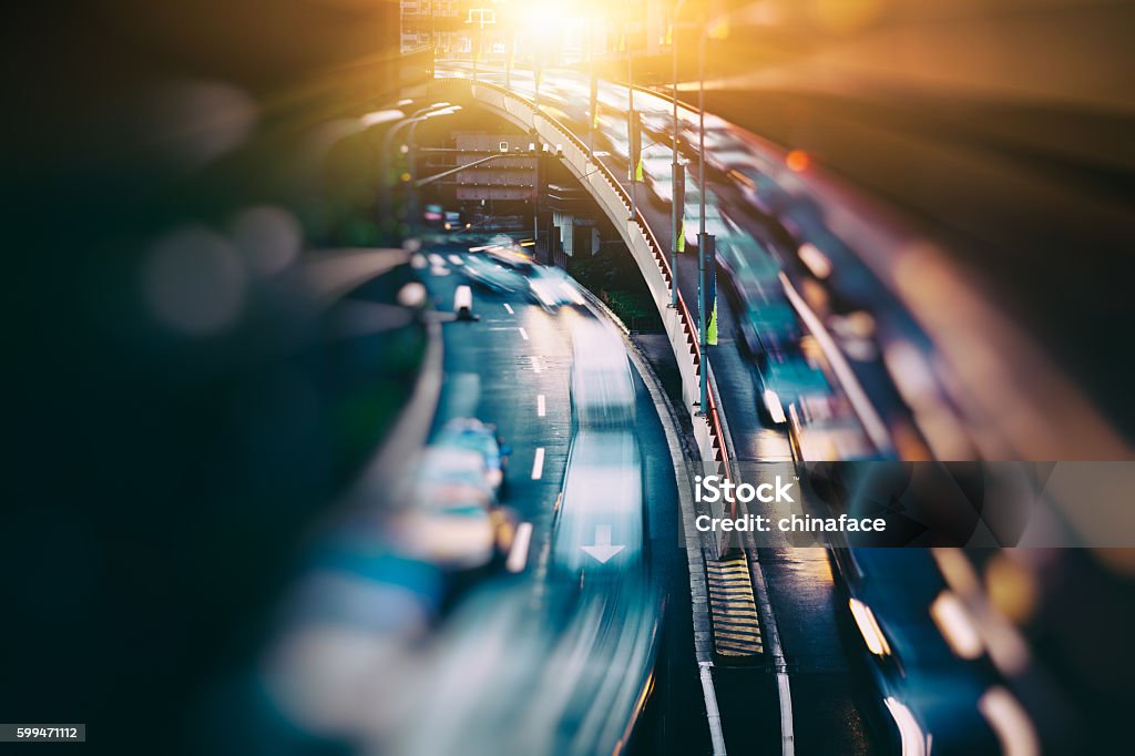 blurred traffic  in central district The urban view of  vehicle light trails on the road. Car Stock Photo