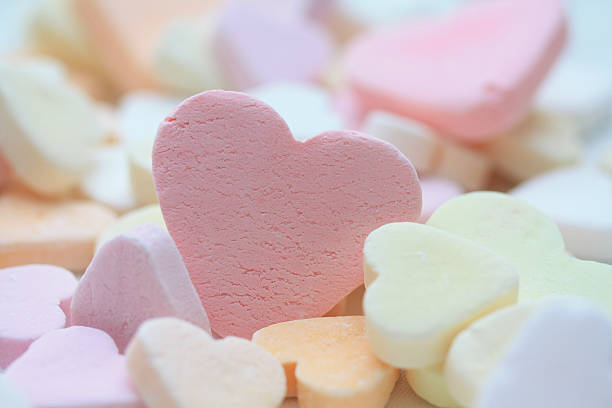 pink valentine candy heart stock photo