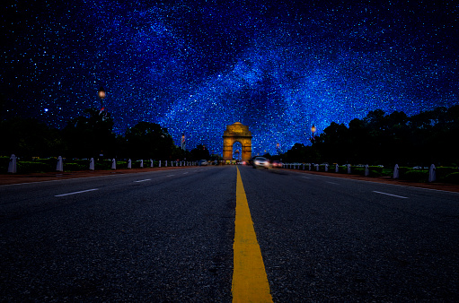 road leading to India Gate stars Galaxy at Night long exposure