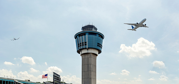 Stock photo of airplanes taking off and landing at Laguardia airport in New York