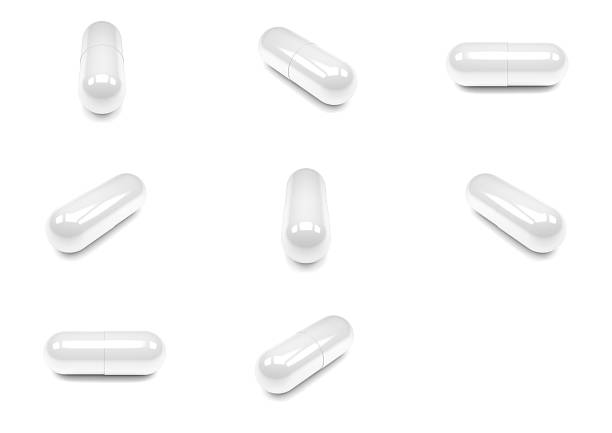 Close up of pills capsule isolated on white background.