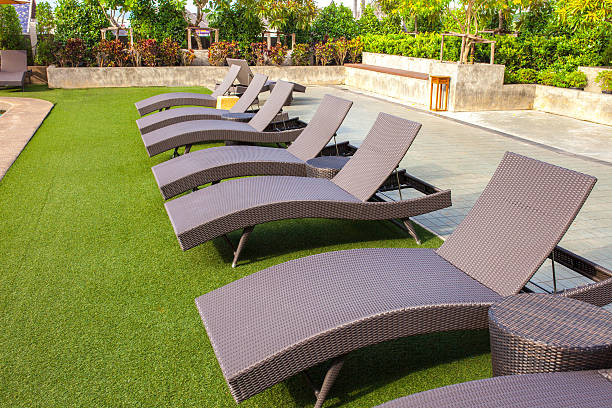 istock chair side swimming pool relax place. View from eye 599480224
