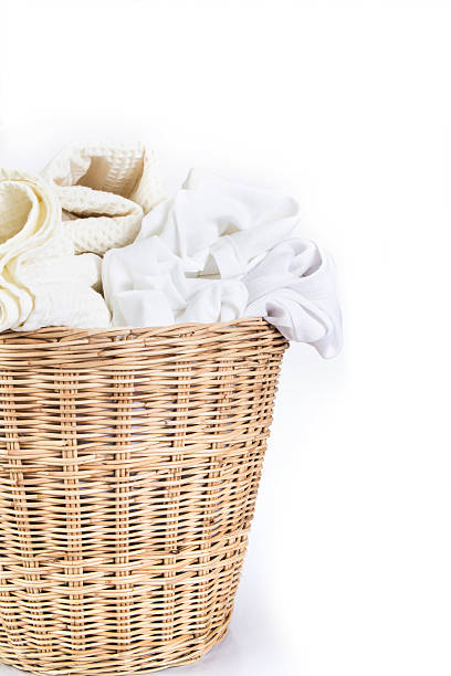 istock white towel and cloth wicker baskets on white background 599482018