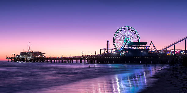 Santa Monica sunset Santa Monica pier at sunset santa monica stock pictures, royalty-free photos & images