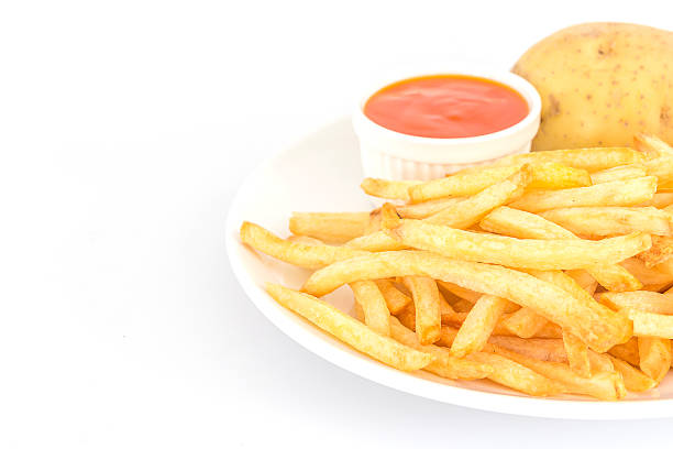 istock French fries with ketchup and potato. 599485492
