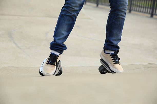 istock freeline skateboarder legs riding on freeline at skatepark 599486312