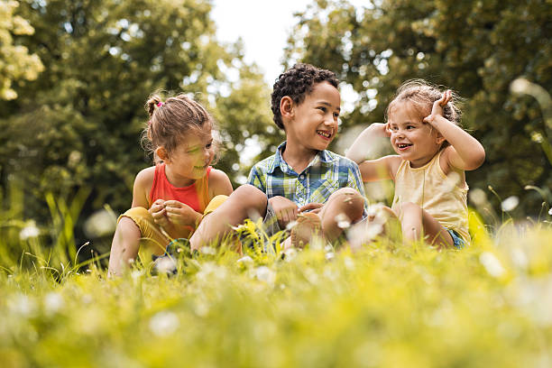 istock Small happy friends having fun together in the park. 599487590