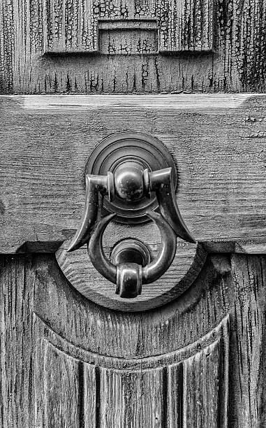 istock Old door with clapper in black and white 599487992