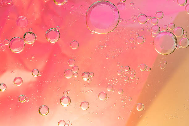istock Colorful water drops bokeh background, 599488608