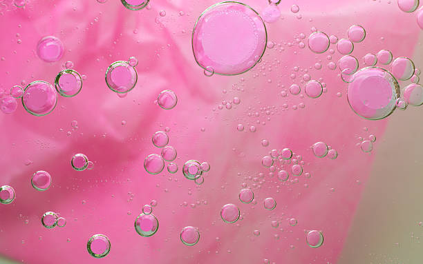 istock water drops bokeh background, pink color background, 599488694