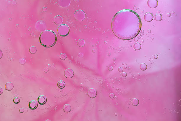 istock Colorful water drops bokeh background, 599489670